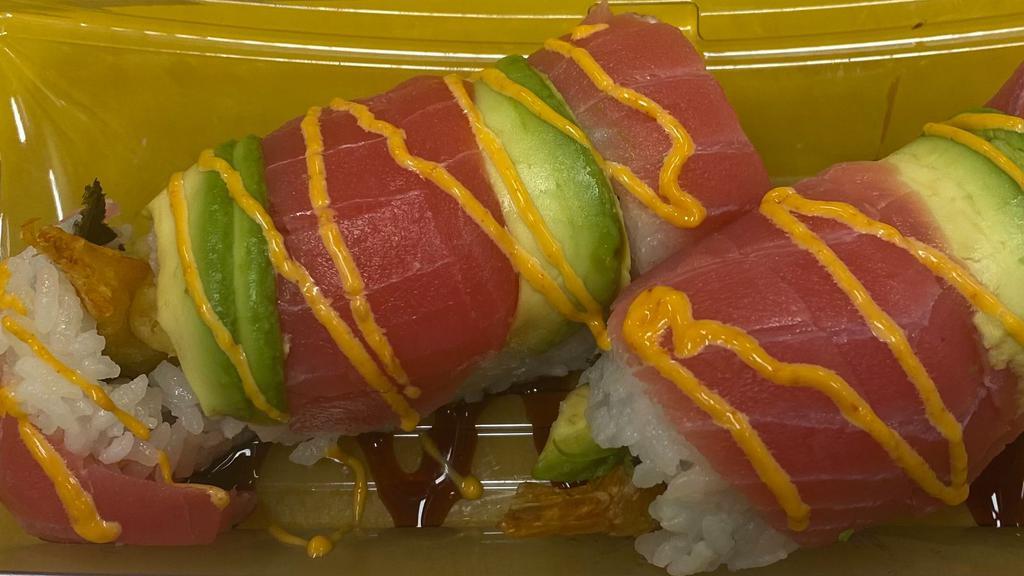 Phoenix Roll · fried shrimp, avocado, cucumber, imitation crab inside, top with tuna  garnish with spicy mayo, eel sauce
