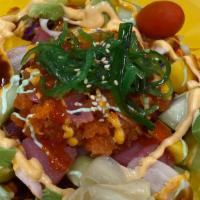 Hawaiin Poke Bowl · Spicy tuna, seaweed salad, masago, spring mix salad, lettuce, carrot, avocado, red cabbage, ...