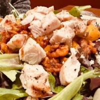 Harvest Salad · Roasted butternut squash, honey maple walnuts, feta, and green apples served over a bed of s...