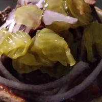 Sandwich On A Bun · Onions - Pickles - Sauce - Jalapenos (optional)