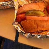 The Chili Dawg · Vienna beef 1/4 lb'er Covered with 