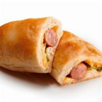 Sausage With Cheese And Jalapeño Kolache · Pillowy soft dough baked full of cheese, sausage, and jalapeño, this kolache has everything ...