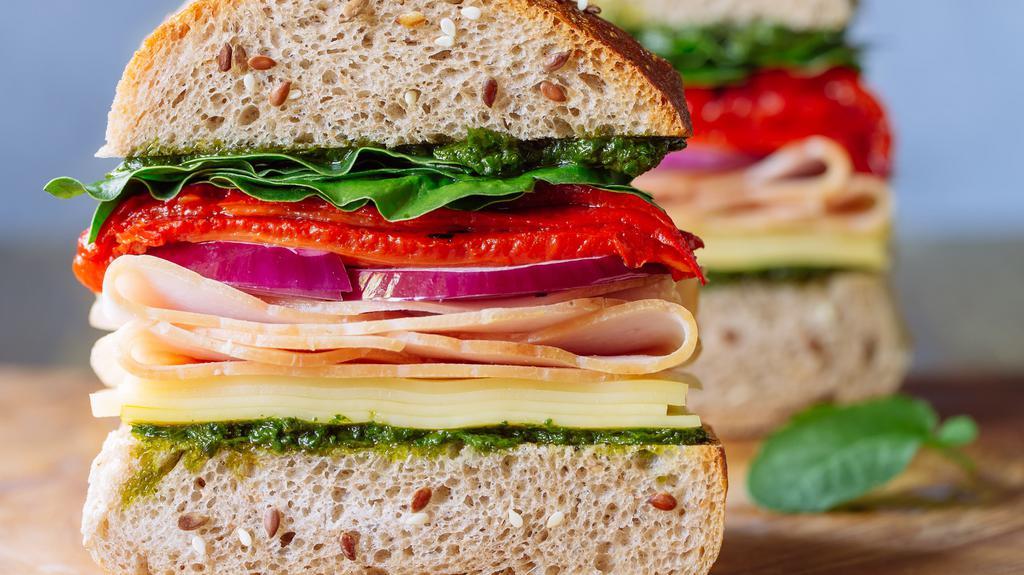 Turkey Gouda Panini · Turkey, spinach, roasted red peppers, red onion and pesto on a. ciabatta bread.