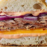 Roast Beef Panini · Roasted beef, cheddar cheese, red onion and chipotle aioli on a. ciabatta bread.