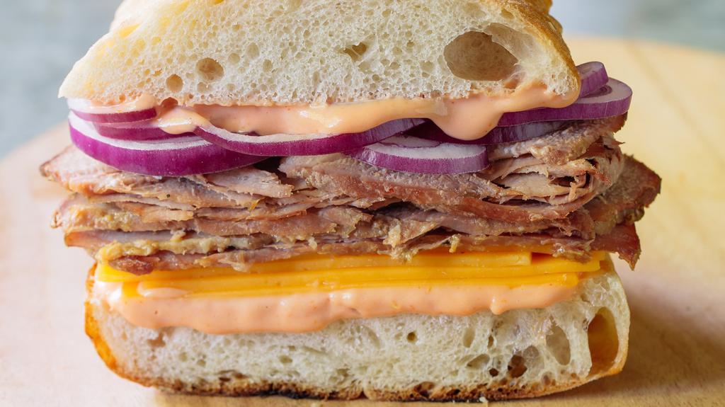 Roast Beef Panini · Roasted beef, cheddar cheese, red onion and chipotle aioli on a. ciabatta bread.