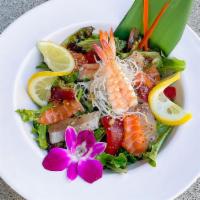 Sashimi Salad · Mixed greens tossed with  house dressing with chef selected fish & 1/2 of avocado glazed wit...