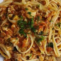 Linguine Clam Sauce · Choice of red or white sauce with clams.