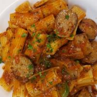 Rigatoni Cacciatore · Italian sausage, bell peppers, mushrooms, onions and garlic in a white wine marinara sauce.