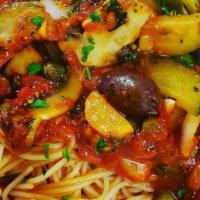 Capellini Mediterranean · With broccoli, mushrooms, tomatoes, onions, peas, zucchini, capers and basil in a red wine t...