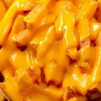 Cheese Fries · Traditional fresh cut french fries with melted cheese.