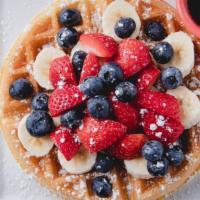 Fruits Berry Waffle · Fresh strawberries, blueberries, banana and power sugar.