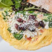 Mediterranean Omelet · Tomatoes, spinach, feta cheese, kalamata olives topped with Mediterranean herbs, and live. S...