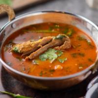 Chettinad Nattu Kozhi Soup(Country Chicken) · Traditional chettinad specialty soup made with freshly ground spices and country 
chicken (w...