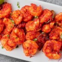 Eral 65(Shrimp) · Sizzling shrimp marinated with house special masala and fried to crispy perfection.(Medium S...