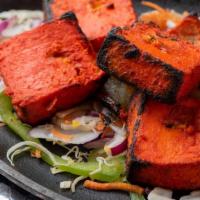Paneer Tikka (Tandoor) · Paneer cubes marinated in chef special marinade and cooked in a traditional tandoor oven on ...