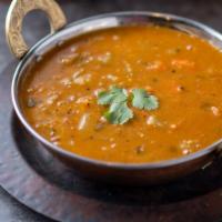 Sambar · Yellow lentil dal based vegetable curry made with chef spl. sambar masala. (Medium Spice Lev...
