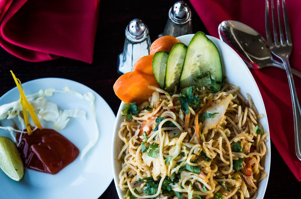 Chicken Noodles · Boiled noodle tossed with chicken seasoning, ginger, soy sauce.