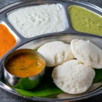 Idli - 3 Pieces · Steamed rice cake made with rice and urad dal batter. Served with sambar and chutney(Gf exce...