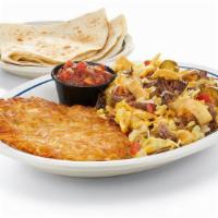 Machaca · Scrambled eggs with shredded beef, Jack & Cheddar, onions, jalapenos, tomatoes & tortilla st...