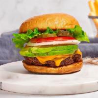 Guac In The City Burger · Grass-fed Angus beef patty topped with avocado, melted cheese, lettuce, tomato, onion, and p...