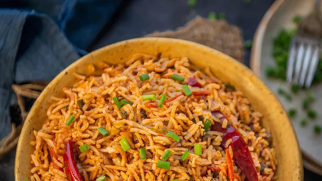 Fried Schezwan Rice [Vegan] · Basmati rice, green peas fragrantly flavored with the choice of your meat and served raita.