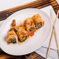 Shaggy Dog Roll · Shrimp tempura topped with crab stick, spicy mayo and eel sauce.