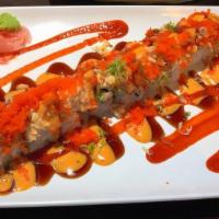Ye'S Ichiban Roll · Shrimp tempura roll topped with oven baked salmon & crab meat mix, spicy mayo, chili sauce, ...