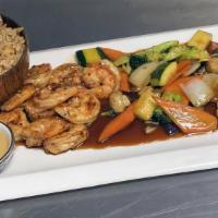 Hibachi Sh (9) · Served with onion soup and vegetables (broccoli, zucchini, carrots, mushroom and onion), dre...