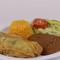 Chile Relleno · A large cheese stuffed poblano pepper. Served with rice, beans, salad and corn or flour tort...