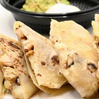 Full Order Quesadilla · In freshly made tortillas, served with guac and sour cream.