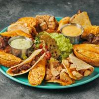 Big Bad Botanas Platter · Mesquite grilled fajita quesadillas*, tacos dorados, fajita nachos & goose eggs all on one p...
