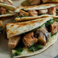 Blue Goose Quesadilla · Mesquite grilled chicken, melted jack cheese, fresh spinach & mushroom. Served with guacamol...
