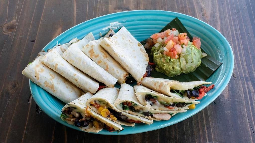 Vegetable Quesadilla · Vegetarian. Melted jack cheese, spinach, poblano & red bell pepper, mushroom, black beans & roasted corn. Served with guacamole & pico de gallo.