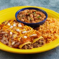Beef Enchiladas · Two ground beef enchiladas rolled in corn tortillas, smothered with chili con carne. Topped ...