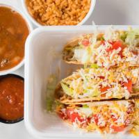 Crispy Tacos Plate · Three ground beef tacos with lettuce, tomatoes and grated cheese. Served with traditional Sp...