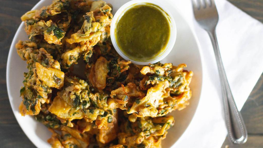 Vegetable Pakora · Seasonal mix vegetables marinated with Chulo spices, and dipped in chickpea flour batter and fried.