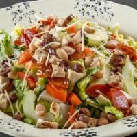 Italian Chopped Salad · Romaine, tomatoes, cucumbers, pepperoni, grilled chicken, olives, cannellini beans, parmigia...