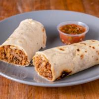 Pastor Burrito · Pork. Burritos are made with meat and refried beans with homemade tortillas.