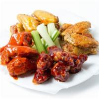 Buffalo Wings (50 Pieces) · Served with celery and one dressing per 10 pieces wings.