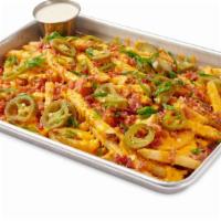 Cheddar Fries Large Cheddar Fries · Hand Cut Fries topped with melted Cheddar Cheese.  Make them 