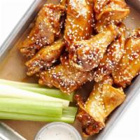 10 Wings · 10 Bone-In Wings tossed in your choice of sauce