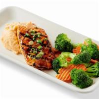 Teriyaki Grilled Salmon · Teriyaki glazed Salmon topped with green onions. served with 2 Sides.