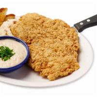 Chicken Fried Chicken · Hand Breaded to Order. Served with Cream Gravy (topped with fresh chives), Texas Toast and y...