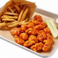 Boneless Wings Dinner · Hand Breaded Boneless Wings tossed in your choice of sauce. Served with one side and Ranch o...