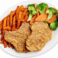 Fried Pork Chops · Hand Breaded Bone In Pork Chops. Comes with two sides and a cup of cream gravy