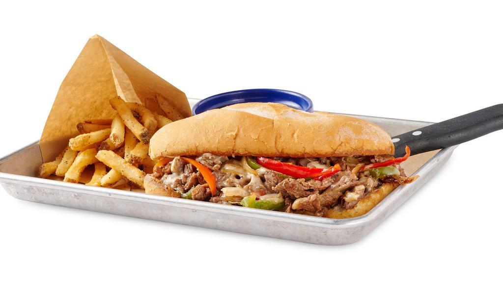 Philly Cheese Steak · Thinly sliced Steak grilled with roasted Bell Peppers, Onions and Provolone Cheese. Served with Au Jus Sauce on the side