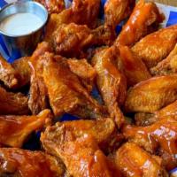 25 Wings · 25 Bone-In Wings, tossed in your choice of sauce, served with one Ranch or Bleu Cheese Dress...