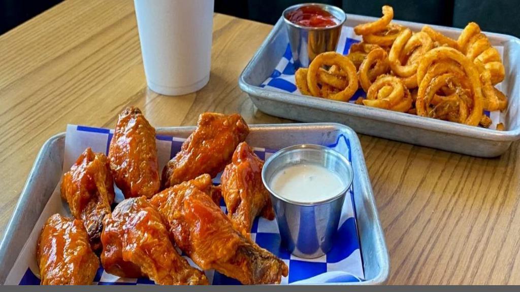 8 Wings Combo · 8 Bone-In Wings, tossed in your choice of sauce. Served with Seasoned Curly fries, one Ranch of Bleu Cheese Dressing and Soft Drink or Iced Tea.