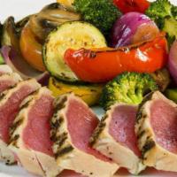 8 Oz. Ahi Tuna · All dinners include your choice of a loaded baked potato, a serving of our fresh-cut fries, ...