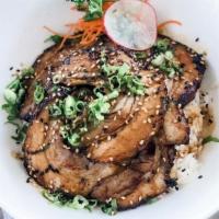 Chashu Don · braised pork belly . over rice . teriyaki sauce .  
green onion . sesame seed
